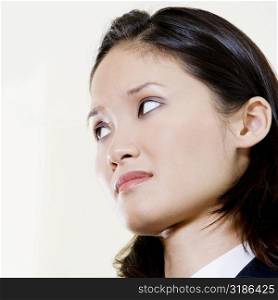Close-up of a businesswoman looking worried