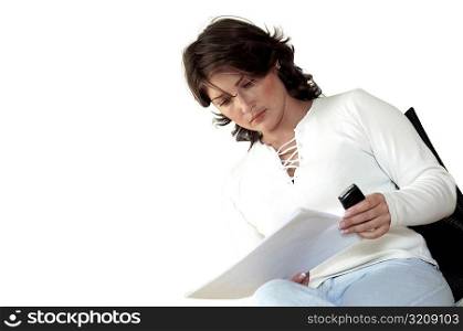 Close-up of a businesswoman reading documents