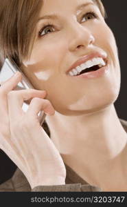 Close-up of a businesswoman talking on a mobile phone