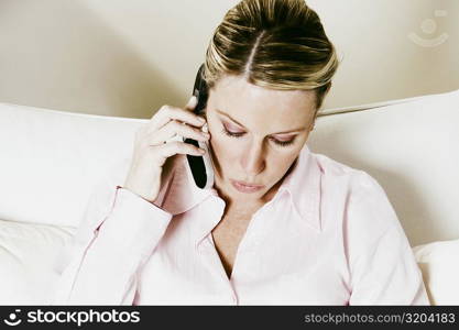 Close-up of a businesswoman talking on a mobile phone