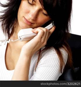 Close-up of a businesswoman talking on the telephone