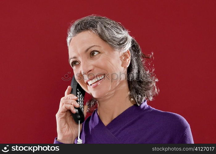 Close-up of a businesswoman talking on the telephone