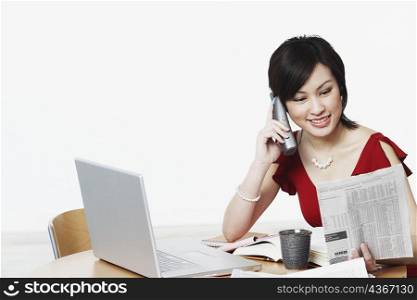 Close-up of a businesswoman talking on the telephone
