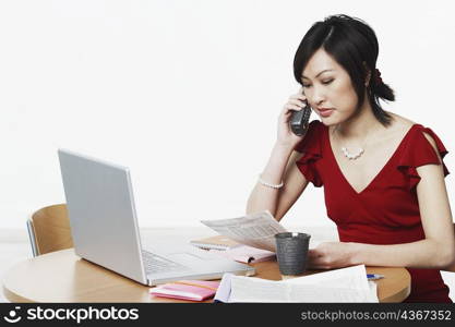 Close-up of a businesswoman talking on the telephone