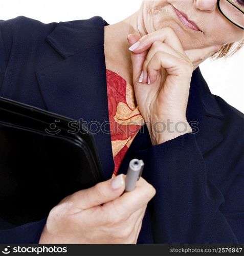 Close-up of a businesswoman thinking