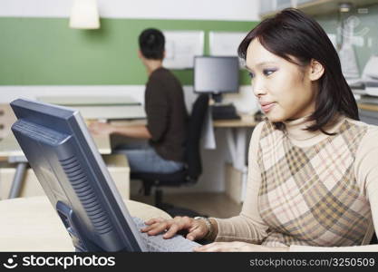 Close-up of a businesswoman using a computer