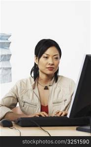 Close-up of a businesswoman using a computer