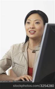Close-up of a businesswoman using a computer