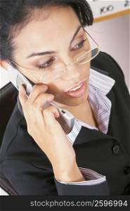 Close-up of a businesswoman using a mobile phone