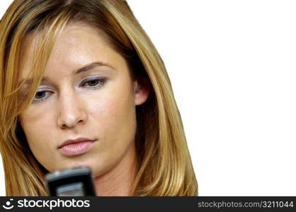 Close-up of a businesswoman using a mobile phone