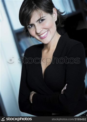 Close-up of a businesswoman with her arms crossed