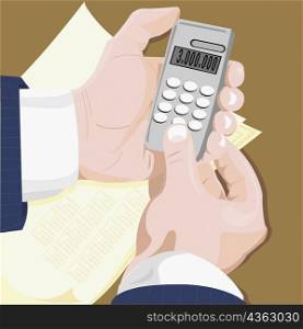 Close-up of a calculator in a businessman&acute;s hands