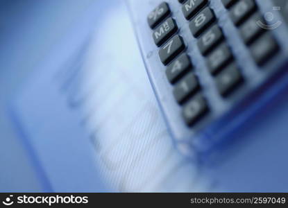 Close-up of a calculator on a document