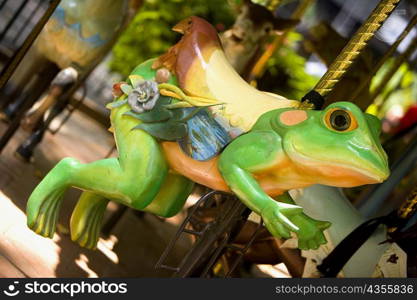 Close-up of a carousel frog