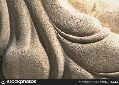 Close-up of a carved stone surface