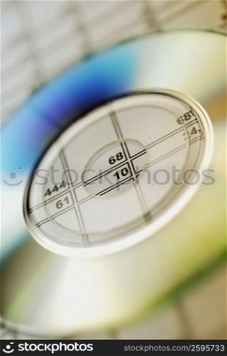 Close-up of a CD on paper