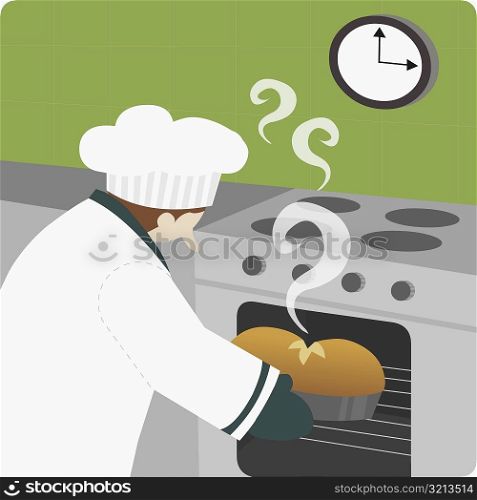 Close-up of a chef baking food in an oven