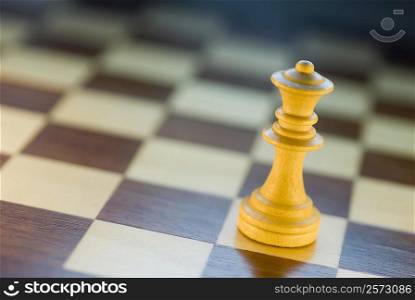 Close-up of a chess piece on a chessboard