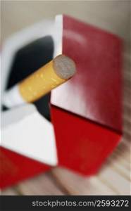 Close-up of a cigarette in a cigarette pack