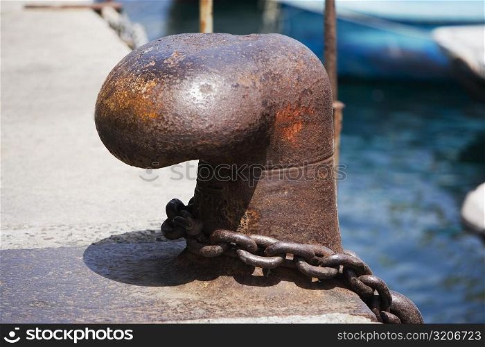 Close-up of a cleat with a chain, Italian Riviera, Santa Margherita Ligure, Genoa, Liguria, Italy