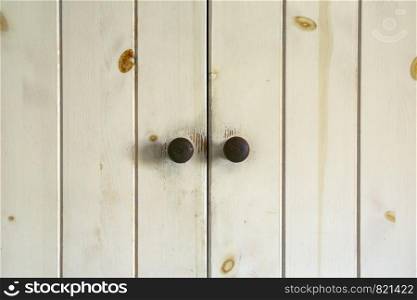 Close up of a closed wooden door brown design background texture vintage interior beauty retro. Close up of a closed wooden door brown design background texture vintage interior beauty