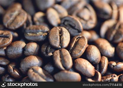 close up of a coffee bean on texture background and sunlight in the morning