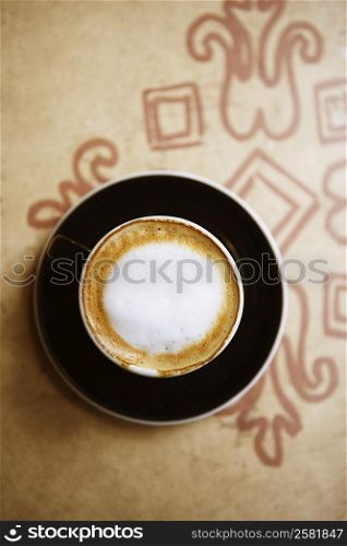 Close-up of a coffee cup on a saucer
