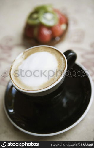 Close-up of a coffee cup on a saucer