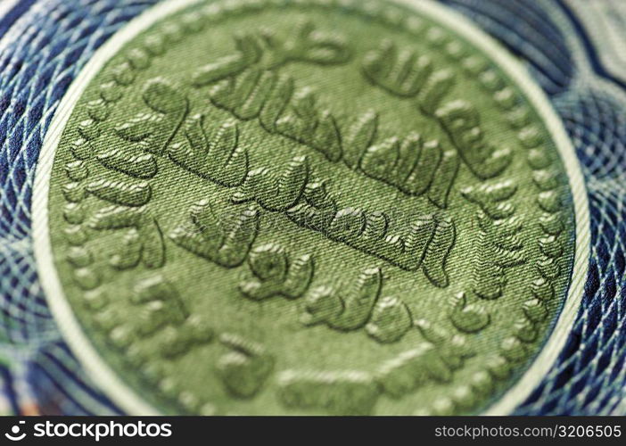 Close-up of a country&acute;s seal on a banknote