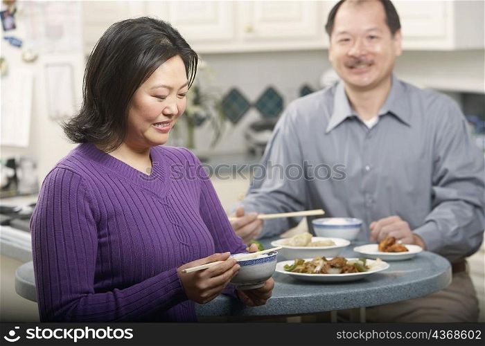 Close-up of a couple eating food