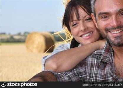 close-up of a couple in a field