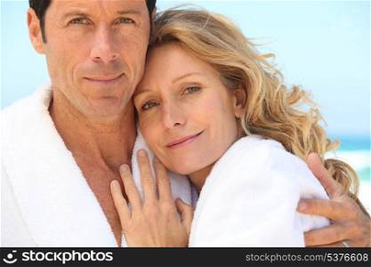 close-up of a couple in bathrobes