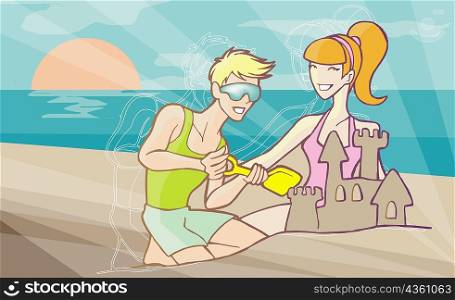 Close-up of a couple making a sand castle