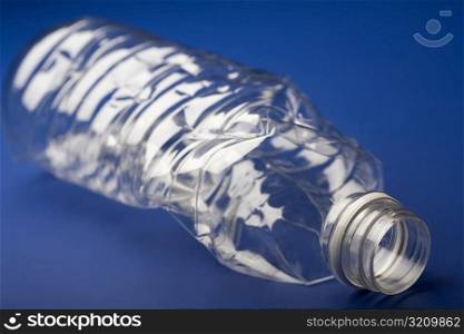 Close-up of a crushed plastic bottle