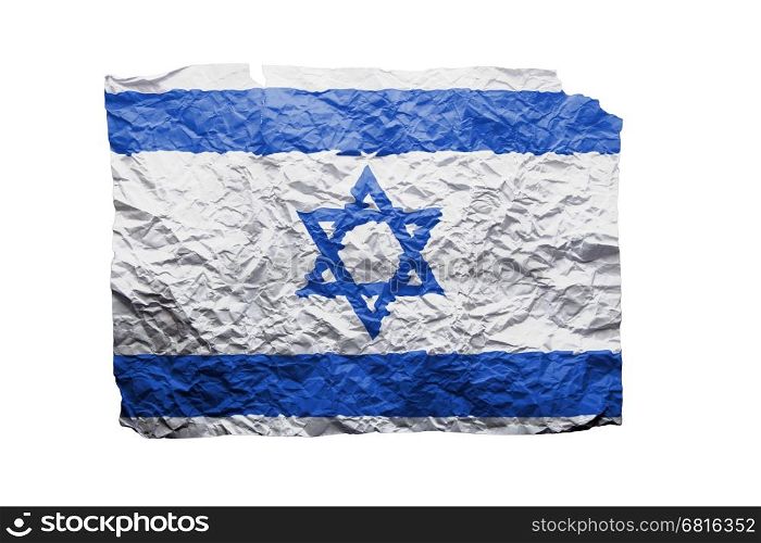 Close up of a curled paper on white background, print of the flag of Israel