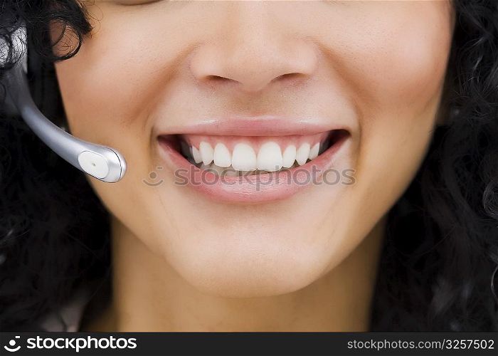 Close-up of a customer service representative smiling