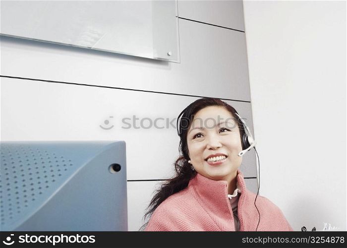 Close-up of a customer service representative wearing a headset