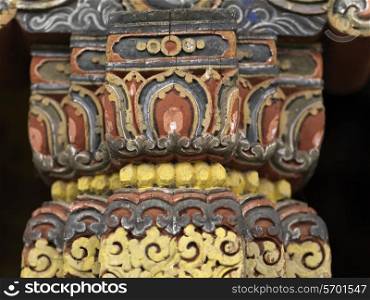 Close-up of a detail of a column of Jambay Lhakhang, Chokhor Valley, Bumthang District, Bhutan