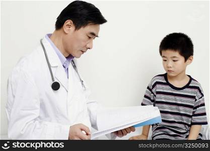 Close-up of a doctor looking at a medical report