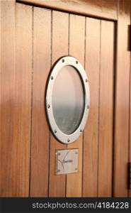Close-up of a door window at cruise ship Silver Shadow, East China Sea