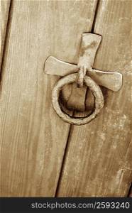 Close-up of a doorknocker on a door