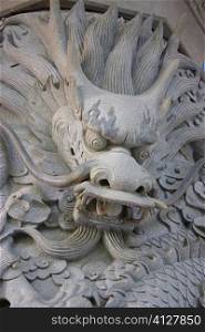 Close-up of a dragon carved in a monastery, Po Lin Monastery, Ngong Ping, Lantau, Hong Kong, China