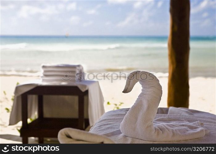 Close-up of a duck shape towel on a table, Playa Del Carmen, Quintana Roo, Mexico