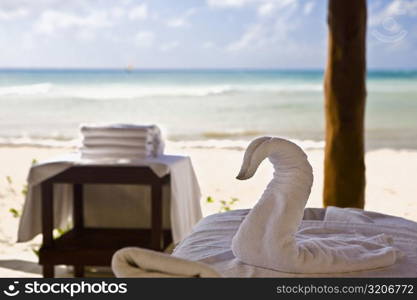 Close-up of a duck shape towel on a table, Playa Del Carmen, Quintana Roo, Mexico