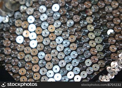 Close-up of a fabric covered with sequins