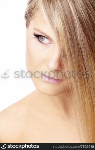 Close up of a face and hair of the blonde, isolated