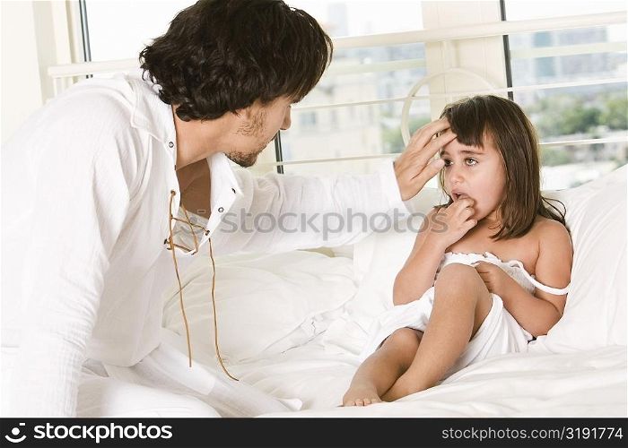 Close-up of a father with his daughter