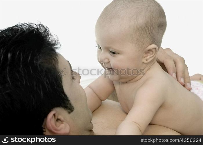 Close-up of a father with his daughter