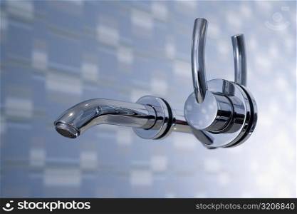 Close-up of a faucet in the bathroom
