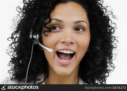 Close-up of a female customer service representative wearing a headset